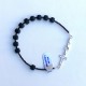 Bracciale decina rosario da uomo con 10 grani cubici in vetro sabbiato nero e croce e moschettone in argento.