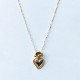 Sacred heart pendant in 18k gold