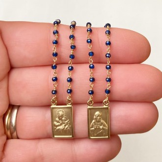 Scapular gold and sapphires