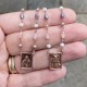 Oblong sapphire scapular