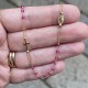 18 kt gold rosary with pink sapphires