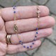 Neck rosary in 18 kt gold and blue sapphires