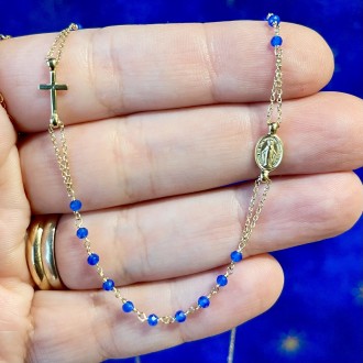 Neck rosary in 18 kt gold and blue sapphires