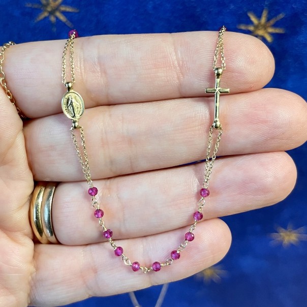 18 kt gold rosary with pink sapphires