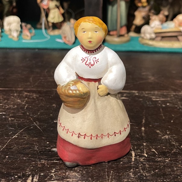 Claudia, woman with eggs -ceramic crib-