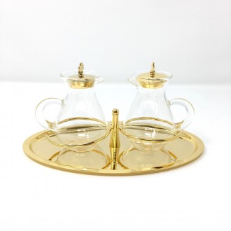 Cruet set in golden brass