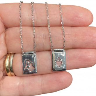 Scapolare traforato in argento 925