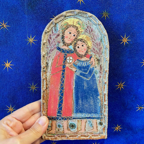 Abbraccio tra Gesù e Giovanni