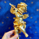 Putto legno dorato flauto