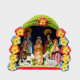 Peruvian nativity scene with large flower garland