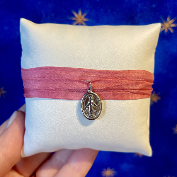 Miraculous medal with silk ribbon