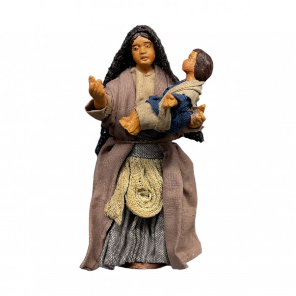 Woman with baby in her arms