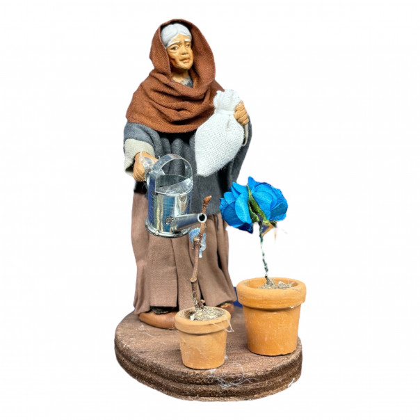 Woman watering the flowers