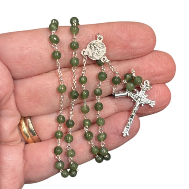 Silver and jade rosary. Silver cross and centerpiece.