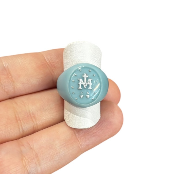Signet ring with monogram and miraculous medal in blue resin