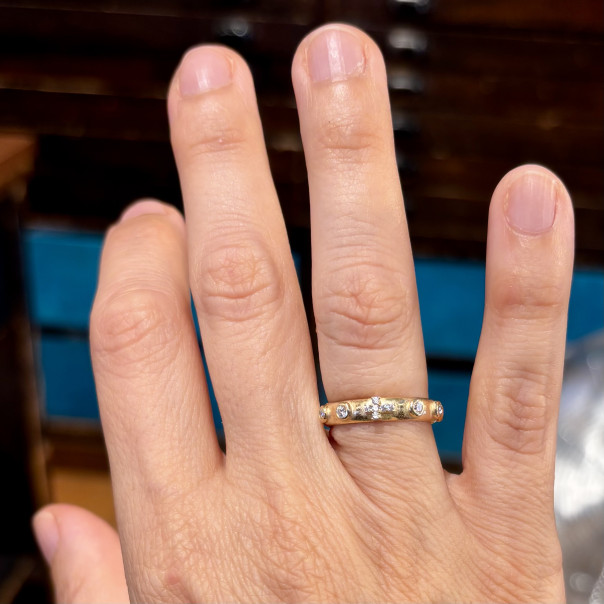 Golden zirconia rosary ring