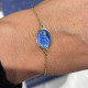 Bracciale in oro 18 carati con medaglia miracolosa smaltata