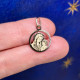 Madonna and Child medal in 18-karat gold, diameter 15 mm.