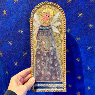 Musician angel, handmade stoneware hanging panel, painted with gilding.