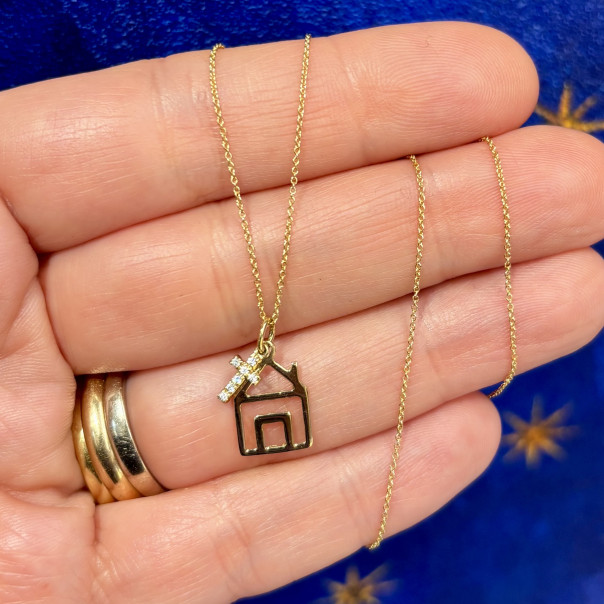 Collana Casa vivente in oro e diamanti